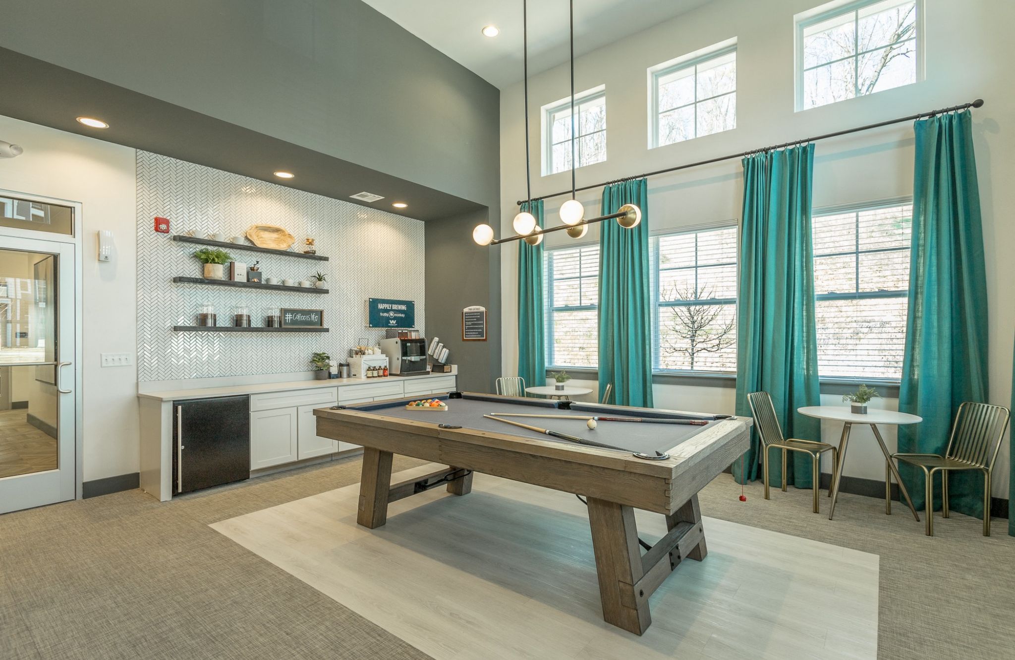 Hawthorne at the W amenity lounge area with pool table and entertainment space with coffee bar