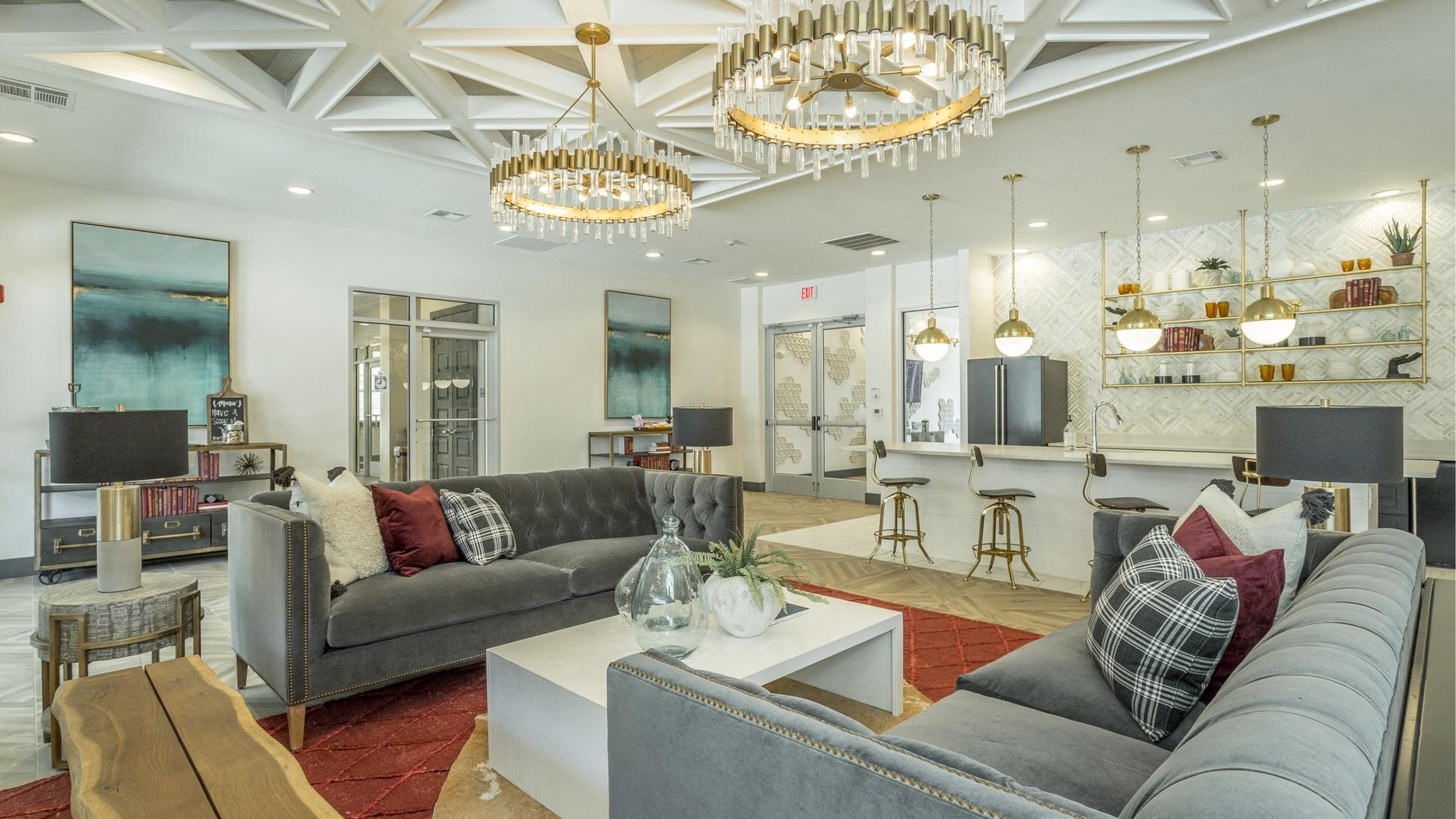 Hawthorne at the W outdoor living room with fireplace and lounge seating